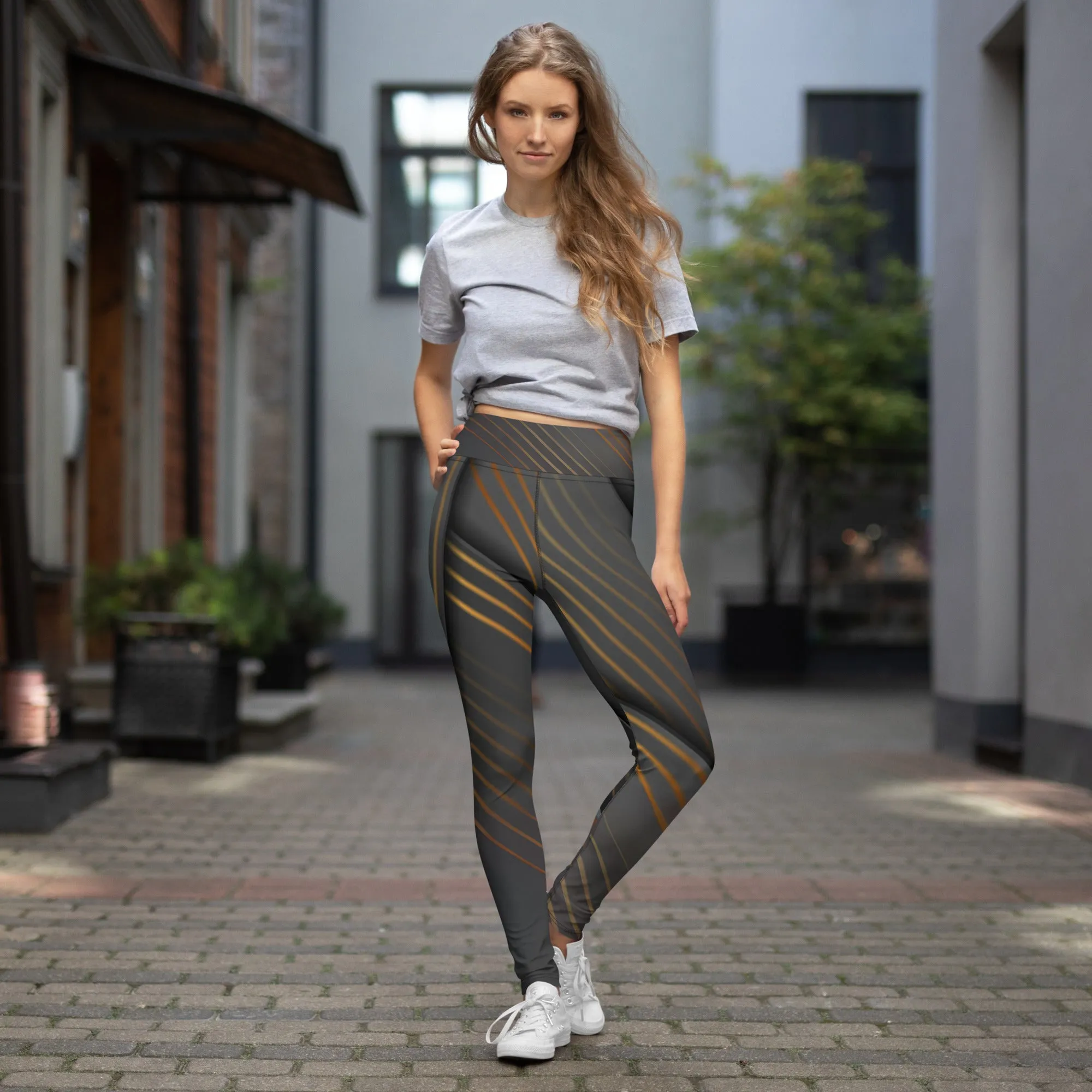 Embrace Elegance in Every Pose with Golden Striped Yoga Leggings