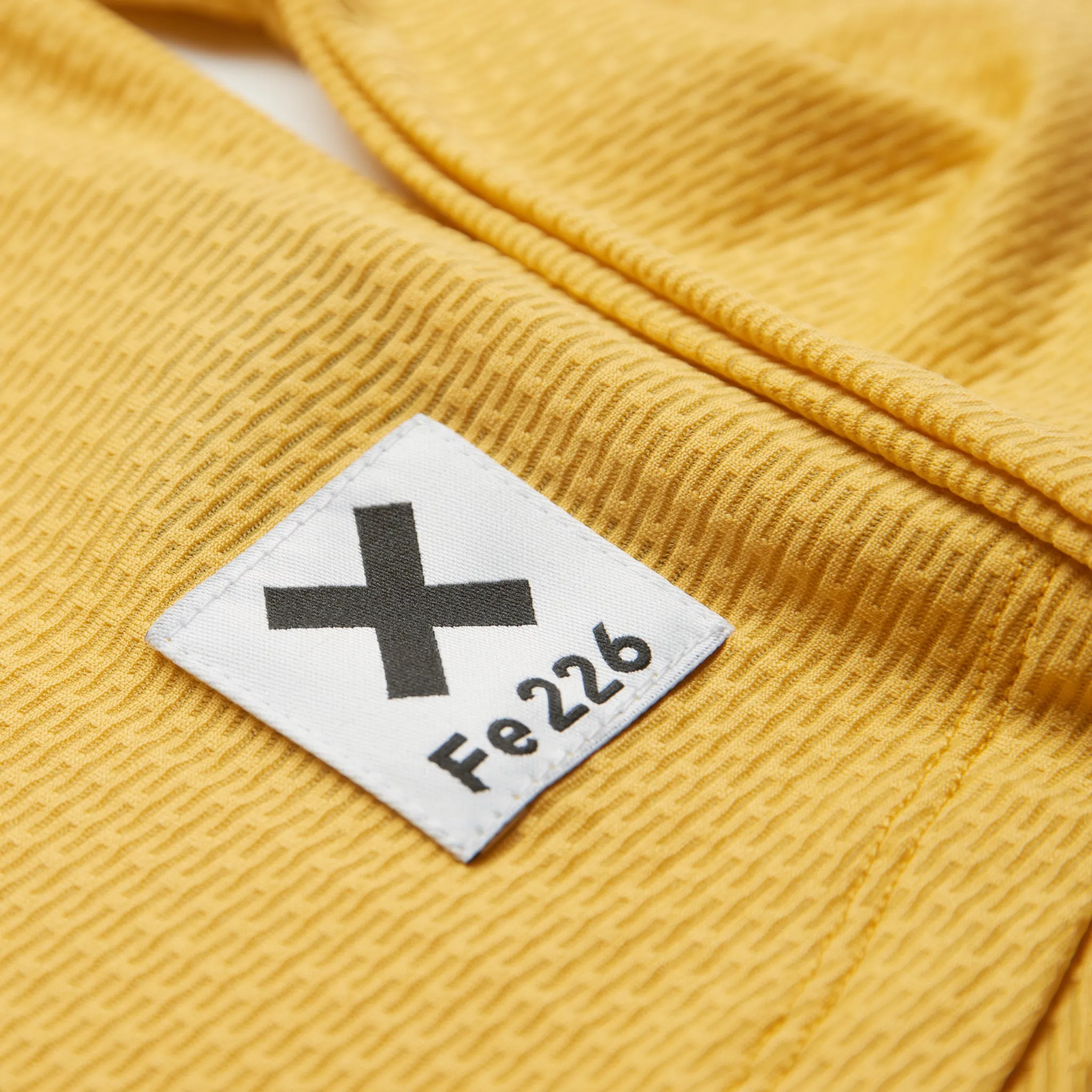 The Women's Long Sleeve Running Shirt - Sulphur Yellow | Fe226 - Left in L and XL